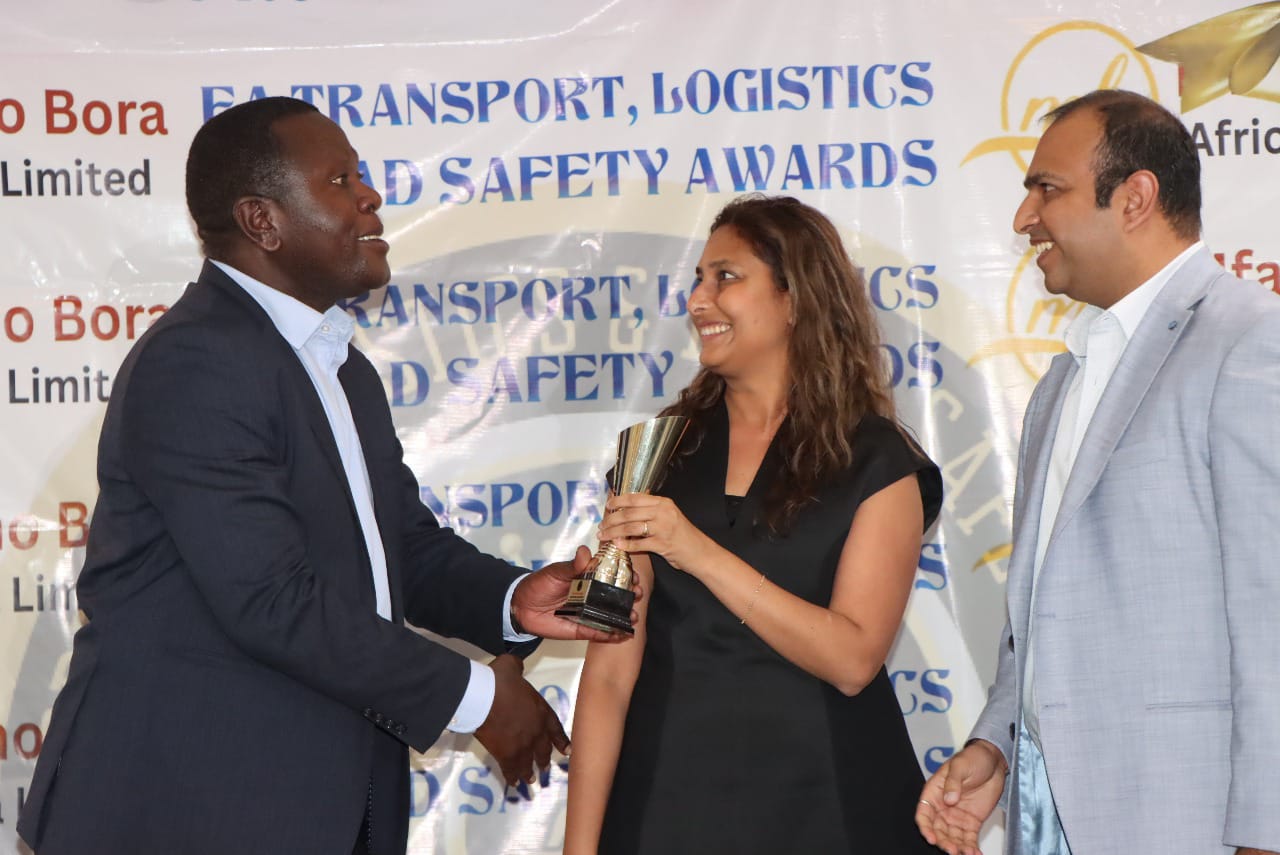 Winners Receiving Awards Trophy From H.E Kalonzo Musyoka