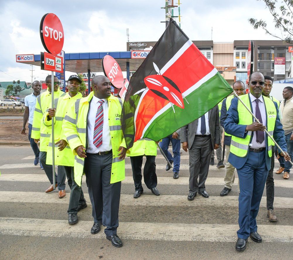 Road Safety Clubs walking with flag